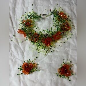 Beautiful hand crafted necklace and clips earrings set.